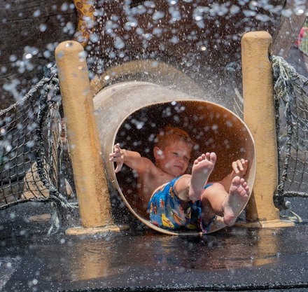 a boy in a tube