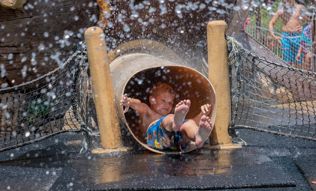 a boy in a tube