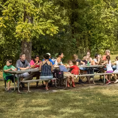 Picnic shelter next to a sand volleyball court